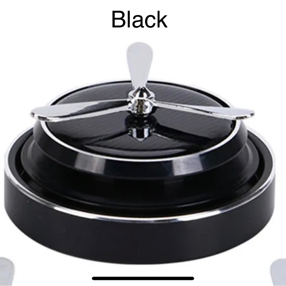 1Pc Car Air Freshener Solar Energy Rotating Car Aromatherapy ( Black)